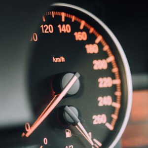 A closeup of a speedometer in a car